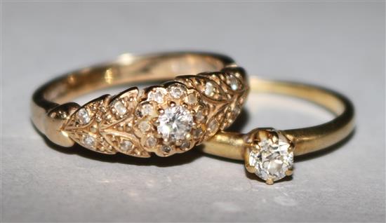 A gold and solitaire diamond ring and a 14ct gold and diamond ring.